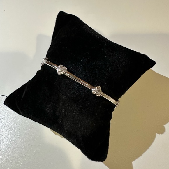 Other - Silvery bangle with three sparkly hearts